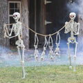 Fun Express Small Skeletons Held Hostage By Large Skeletons Halloween Decorating Kit - 6 Pc